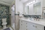Designer bathrooms with fabulous tile work in the bathrooms and large luxe showers
